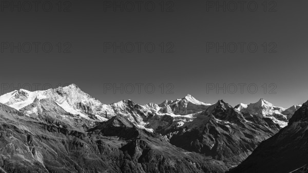 Snowy peaks of the Weisshorn, Schalihorn, Zinalrothorn, Besso and Obergabelhorn mountains, black and white photo, Val d'Anniviers, Valais Alps, Canton of Valais, Switzerland