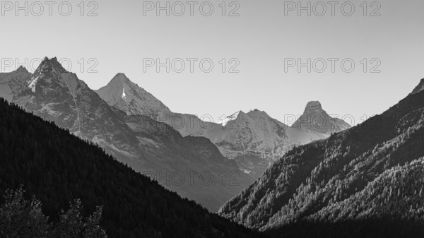 The snow-capped peaks of the Besso, Obergabelhorn and Matterhorn mountains, black and white photo, Val d'Anniviers, Valais Alps, Canton of Valais, Switzerland