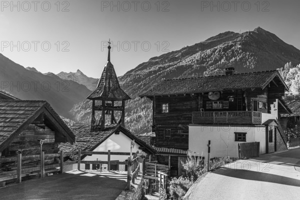 Small chapel in the mountain village of St-Jean, black and white photo, Val d'Anniviers, Valais Alps, Canton of Valais, Switzerland