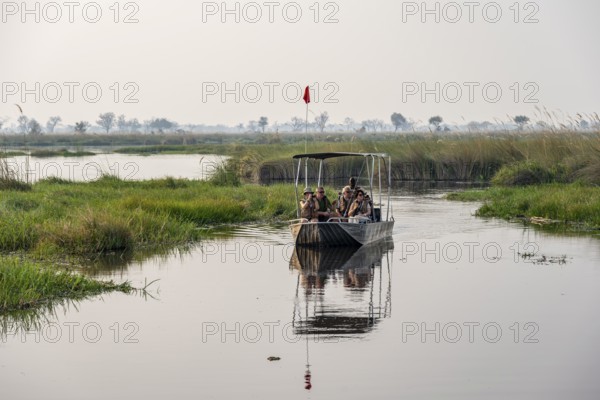 Safari by boat, tourists, Xakanaxa Lagoon, Okavango Delta, Moremi Game Reserve, Botswana