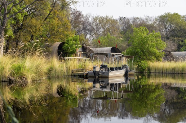 Boat for tourists on Okavango Delta, Xakanaxa, Moremi Game Reserve, Botswana