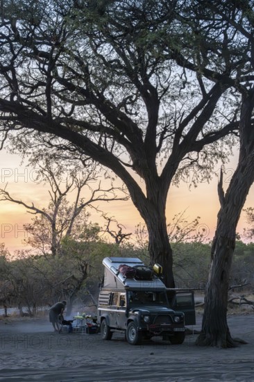Campground with off-road car and roof tent, Savuti, Chobe National Park, Botswana