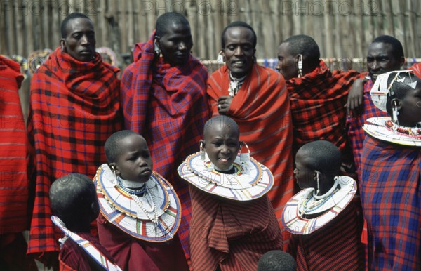 Maasai men and girls in their village in Ngorongoro Crater, Tanzania, Africa, June 2000, vintage, retro, old, historic