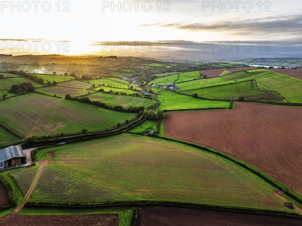 Colours of autumn Fields and Farms over Sheldon from a drone, Torbay, Devon, England, United Kingdom