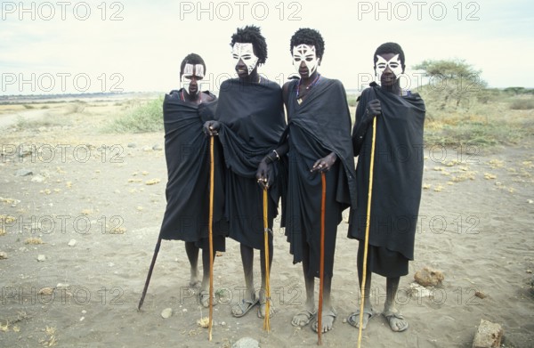 Maasai boys with white painted faces on the occasion of their initiation, Ngorongoro Crater, Tanzania, Africa, June 2000, vintage, retro, old, historic
