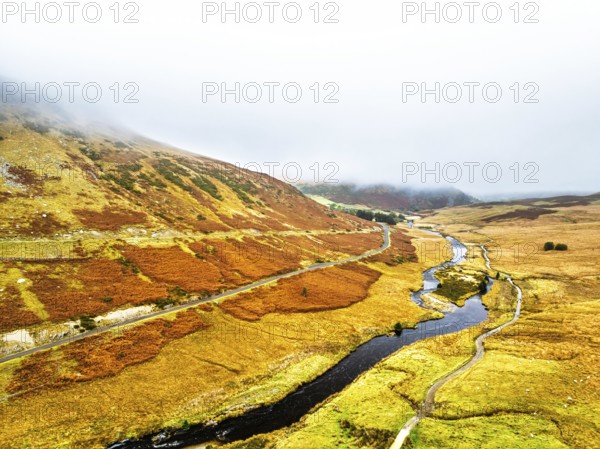 Autumn over Claerwen Dam, Claerwen Valley, Elan Valley Reservoir, Rhayader, Powys, Wales, UK