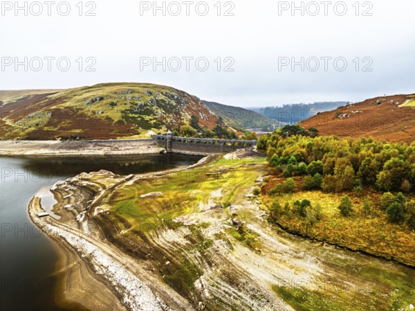 Autumn over Craig Goch Dam from a drone, Elan Valley Reservoirs, Elan Valley, Rhayader, Powys, Wales, UK