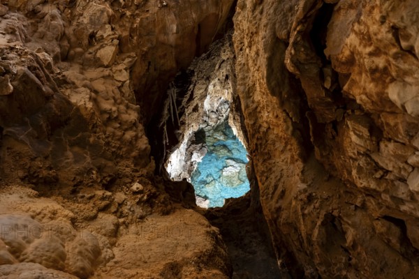 Seawater penetrates the cave through underground access, stalactite cave, Grotta del Fico, Gulf of Orosei, Baunei, Sardinia, Italy