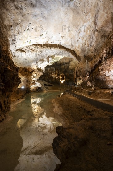 Stalactites and stalagmites, small underground lake, rock formations in a stalactite cave, Grotta del Fico, Gulf of Orosei, Baunei, Sardinia, Italy