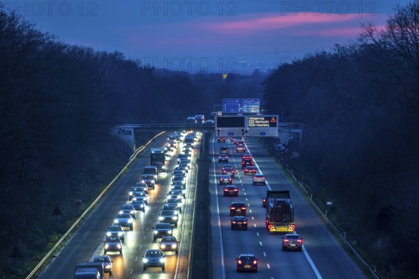 Evening traffic on the A52 motorway, between Düsseldorf and Essen, in front of the Breitscheid motorway junction, partly slow rush hour traffic, looking south, North Rhine-Westphalia, Germany