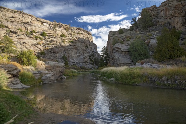 Alcova, Wyoming - Devil's Gate, a canyon cut through solid rock by the Sweetwater River. Emigrants on the Oregon Trail, Mormon Trail, and California Trail passed this way in the mid-19th century