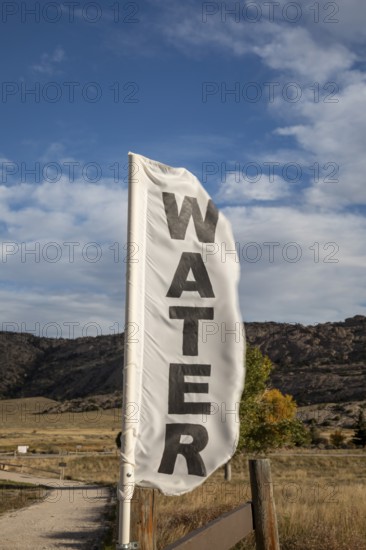 Alcova, Wyoming - A banner marks the location of drinking water at the Mormon Handcart Historic Site. Emigrants on the Mormon Trail passed this site on their way to Utah in the mid-19th century