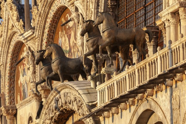 The Quadriga of St. Mark's Basilica, are a group of copies of the four life-size gilded bronze sculptures, Loggia dei Cavalli on the west portal of St. Mark's Basilica, Venice, Veneto, Italy
