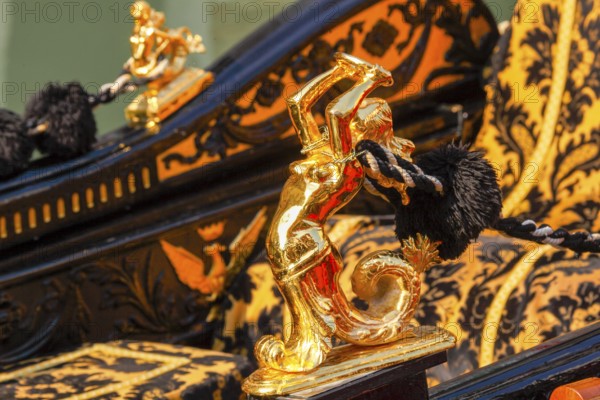 Ornamental decorations on a gondola, Venice, Veneto, Italy