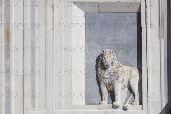 3-dimensional lion relief on the façade of the Scuola Grande di San Marco, Venice, Italy