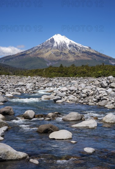 Mount Taranaki, in the foreground Stony River (Hangatahua River) . Egmont National Park, Taranaki Region, North Island, New Zealand