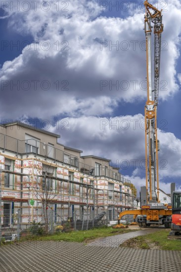 Installation of thermal insulation on a residential block, Eckental, Middle Franconia, Bavaria, Germany