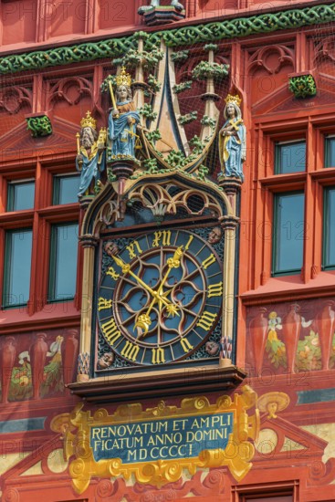 Exterior view of the magnificent clock at the Red Town Hall, Market Square, Basel