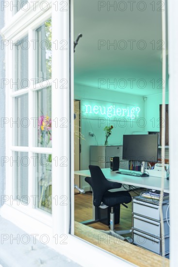 View of an office room, inscription Curious