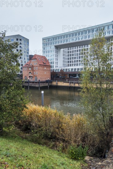 Old customs house with mirror house, HafenCity, Hamburg, Germany