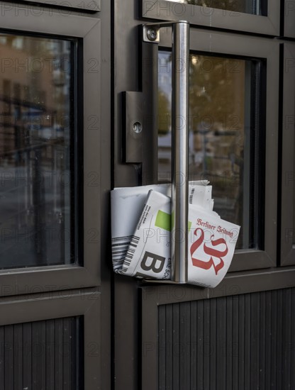 Traditional delivery of a daily newspaper, Berlin, Germany