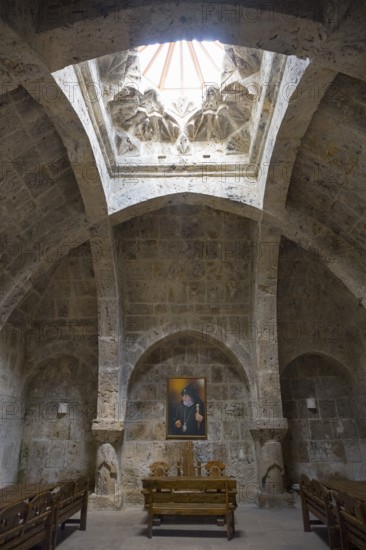 Church interior with skylight and painting, stone walls and vault, refectory interior, dining room, Haghartsin monastery, Hagarzin, Tavush province, Armenia