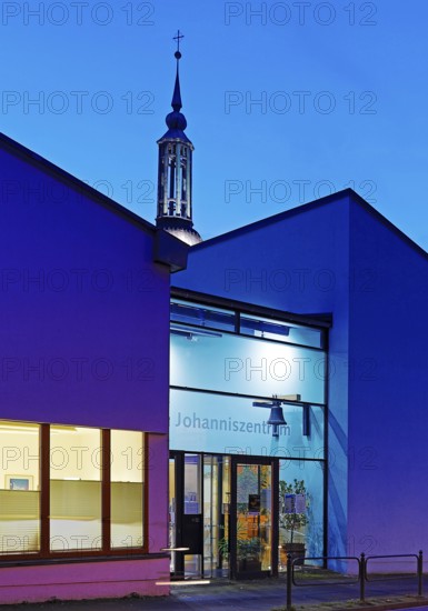 The Johanniszentrum with the top of St. John's Church in the evening, Witten, Ruhr area, Germany