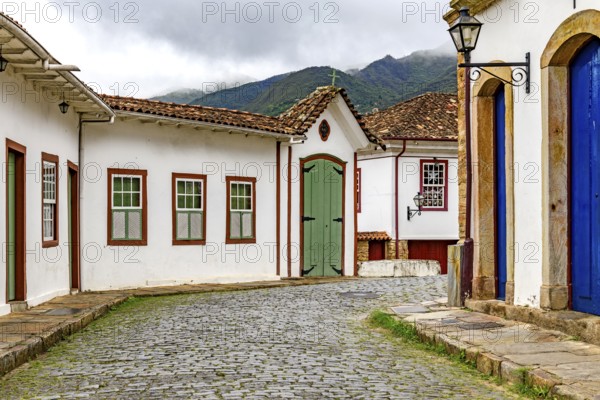 Old colonial houses and chapel on the streets of the historic city of Ouro Preto, Ouro Preto, Minas Gerais, Brazil
