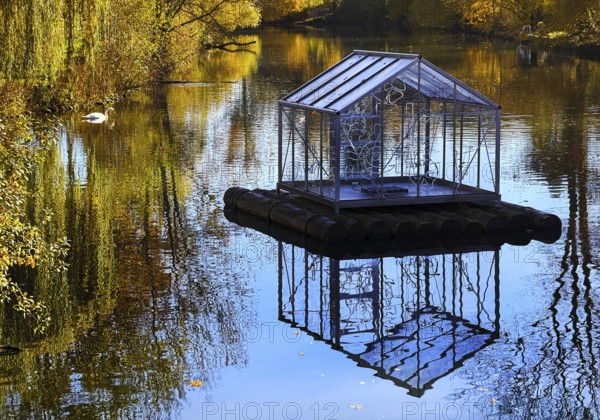 The river Lippe in Grünen Winkel with the artwork Arche by Christoph Hildebrand, Lichtpromenade Lippstadt, North Rhine-Westphalia, Germany