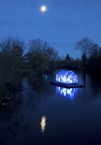 The river Lippe with the artwork Arche by Christoph Hildebrand at night with full moon, Lippstadt light promenade, North Rhine-Westphalia, Germany