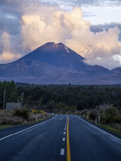 Roadshot, Mount Ngauruhoe evening at sunset, road SH 47. Tongariro National Park, North Island, New Zealand