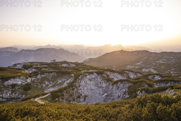 At the Berchtesgaden High Throne in summer at sunset, view of the Störhaus on Untersberg. Berchtesgadener Land