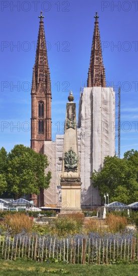 Waterloo monument, St. Boniface Catholic Church, scaffolding, renovation, trees, garden, flower bed, plants, lawn, wooden fence, general architecture, blue sky, cirrus clouds, Luisenplatz, Luisenstraße, Wiesbaden, state capital, district-free city, Hesse, Germany