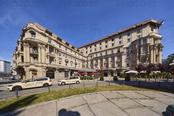 Nassauer Hof, hotel, architect Ernst Neufert, historic building, general architecture, taxi, taxi stand, barrier bollard, lawn, natural stone sidewalk, blue sky, cirrus clouds, Kaiser-Friedrich-Platz square, Wiesbaden, state capital, district-free city, Hesse, Germany