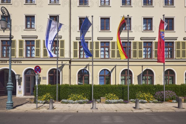 State parliament, flagpoles, flags, Israeli flag, German flag, European flag, Hesse flag, façade with windows and shutters, lantern, barrier bollard, hedge, flower bed, sunny, Schlossplatz, Wiesbaden, state capital, district-free city, Hesse, Germany