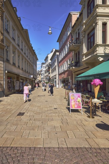 Pedestrian zone, general architecture, residential and commercial buildings, shops, shopping, retail, outdoor area of a restaurant, ice cream parlour, Maison Köller - L'Art Sucré, shop and café, paving and concrete paving stone walkway, pedestrians as accessories, blue sky, cloudless, market street, Wiesbaden, state capital, district-free city, Hesse, Germany