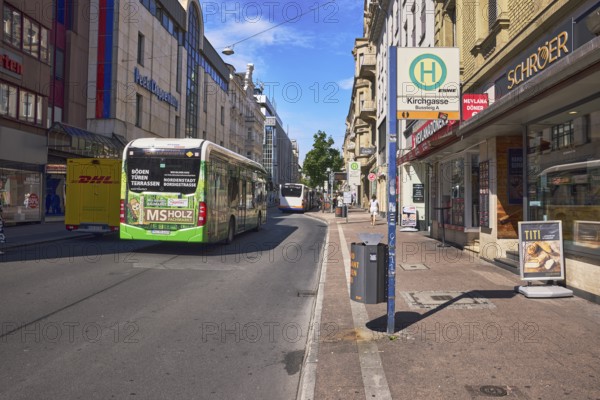 Kirchgasse bus platform A, public trash can, general architecture, residential and commercial buildings, sidewalk, trees, blue sky, cumulus clouds, Friedrichstraße, Wiesbaden, state capital, district-free city, Hesse, Germany
