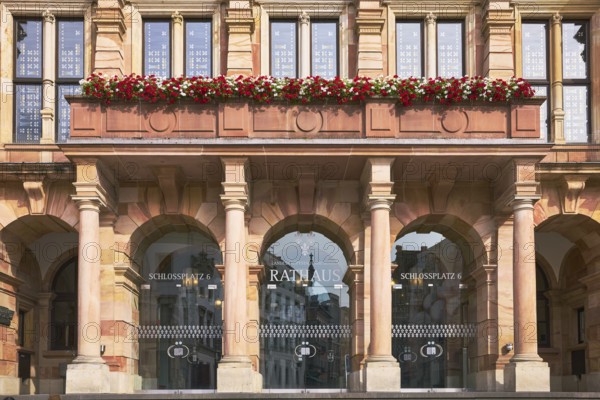 Town hall, entrance, door, round arches, columns, architect Georg von Hauberrisser, neo-Renaissance building style, sandstone building material, façade with windows and flower boxes, sunny, Schlossplatz square, Wiesbaden, state capital, district-free city, Hesse, Germany