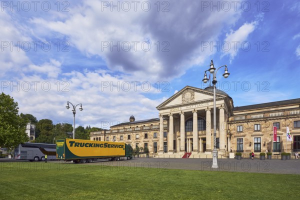 Spa hotel, neo-classical style, architect Friedrich von Thiersch, columns, lantern, trees, lawn, coach, semitrailer, blue sky, cumulus clouds, nimbostratus clouds, Kurhausplatz, Wiesbaden, state capital, district-free city, Hesse, Germany