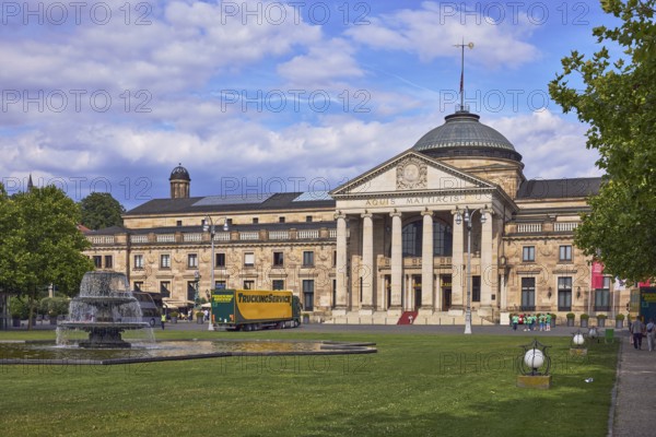 Spa hotel, neo-classical style, architect Friedrich von Thiersch, pillars, green area, bowling green, lawn, cascade fountain, blue sky, cumulus clouds, Kurhausplatz square, Wiesbaden, state capital, district-free city, Hesse, Germany