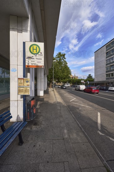 Spa hotel Theater bus stop, public transport, bench, zigzag line road marking, vehicles, general architecture, commercial building, lantern, trees, blue sky, cumulus clouds, Burgstraße street, Wiesbaden, state capital, district-free city, Hesse, Germany