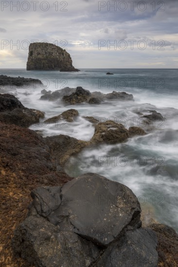 Rocky coast, volcanic rock formations, coast near Porto da Cruz, Madeira, Portugal