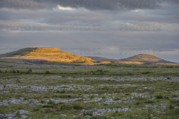 Sunset over the karst landscape of the Burren, Keelhilla, Carran, County Clare, Ireland