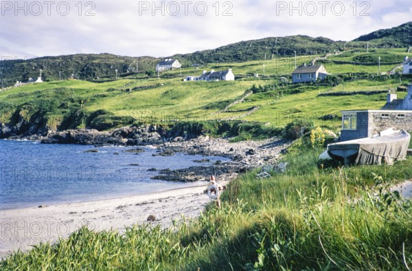 Houses and beach at coastal village of Portnoo, Narin beach, County Donegal, Ireland 1969