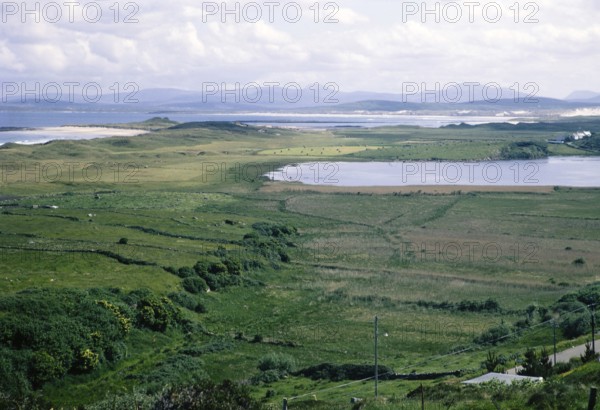 Coastal landscape over Clooney Lake from village of Portnoo, Narin beach, County Donegal, Ireland 1969