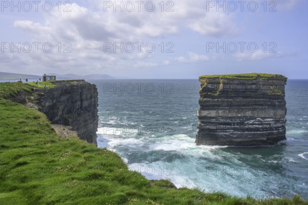 Waves blaze against the Dun Briste Sea Stack at Downpatrick Head, Lackan, County Mayo, Ireland
