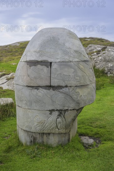 Stone monument with animal representations on the way to the Slieve League cliffs, West Donegal, County Donegal, Ireland