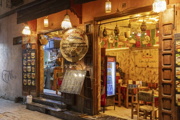 Cosy restaurant with traditional decoration and warm light