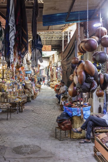 Bustling Moroccan bazaar with a variety of goods and a cozy atmosphere