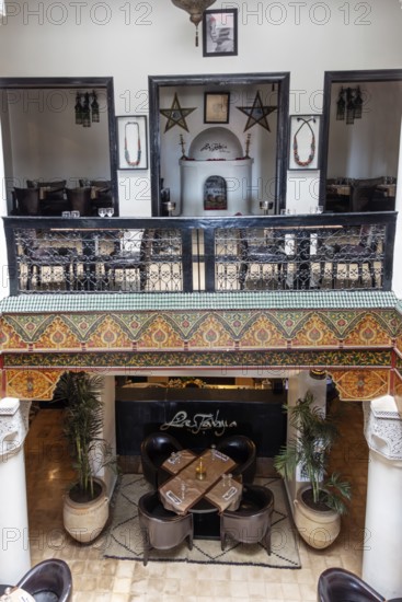 Cosy Moroccan restaurant with decorative interiors and plants